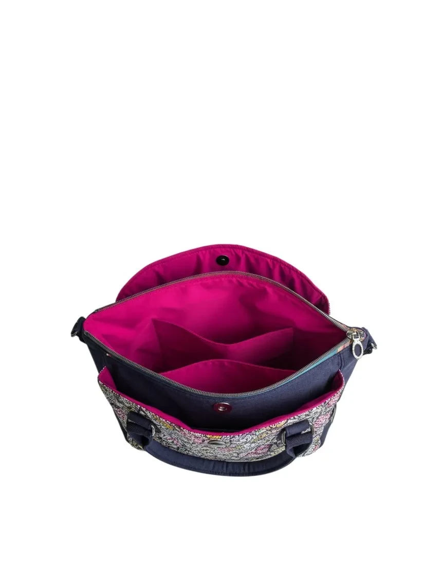 Fixation Fibre and Function structured handbag interior with vibrant fuchsia lining, zippered pocket, and compartments.